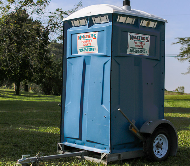 Tow behind portable toilet.